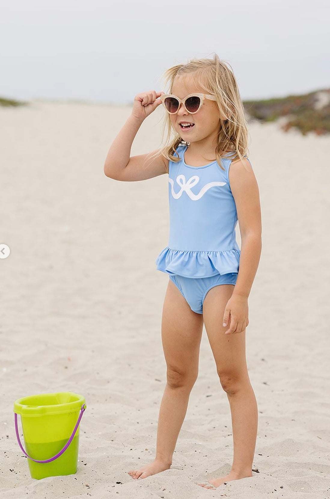 Girls Blue Ruffle Swimsuit with White Bow Appliqué by Funtasia Too! - Persnickety Shop