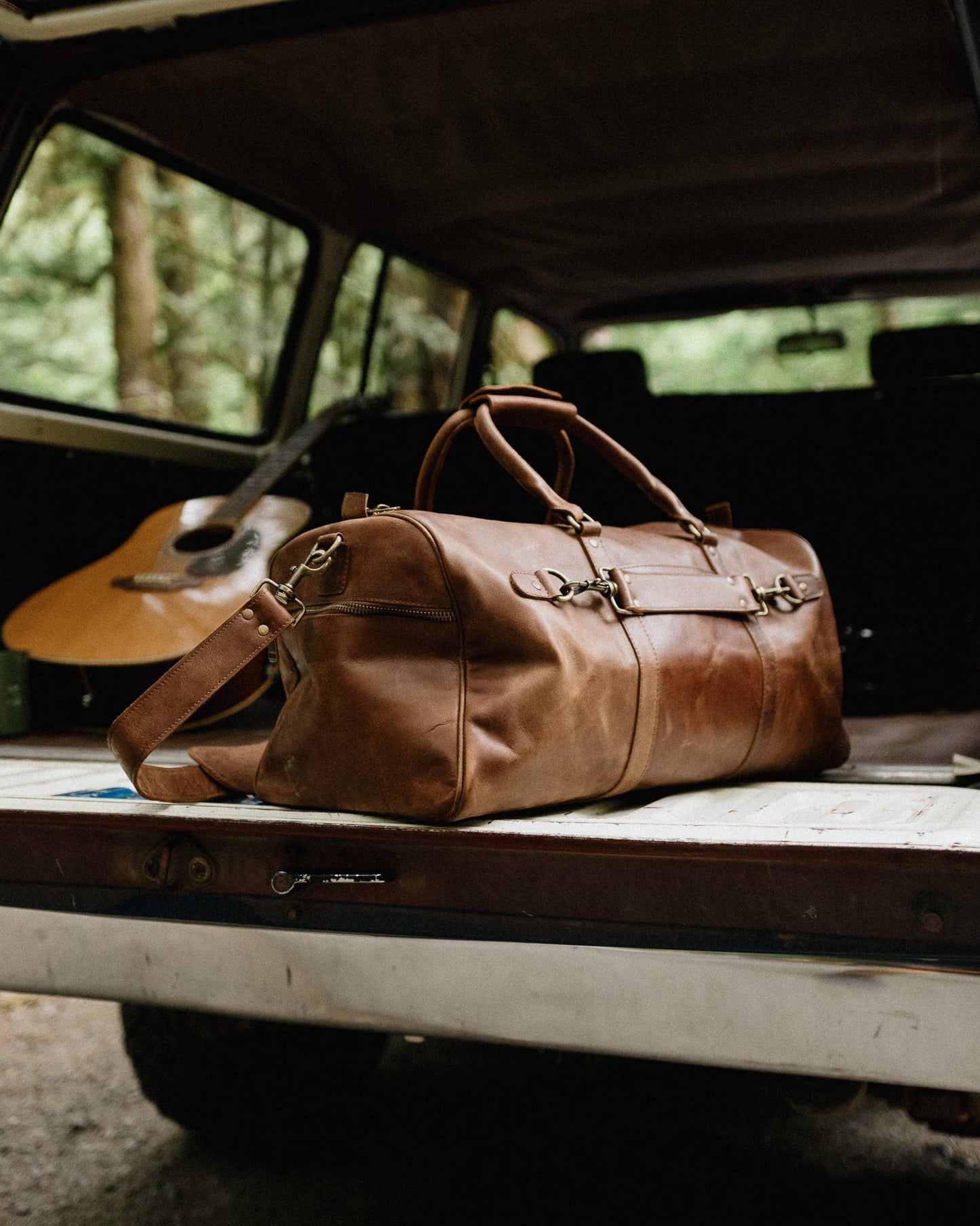 Buffalo Leather Duffle with Trolley Sleeve: Saddle Brown