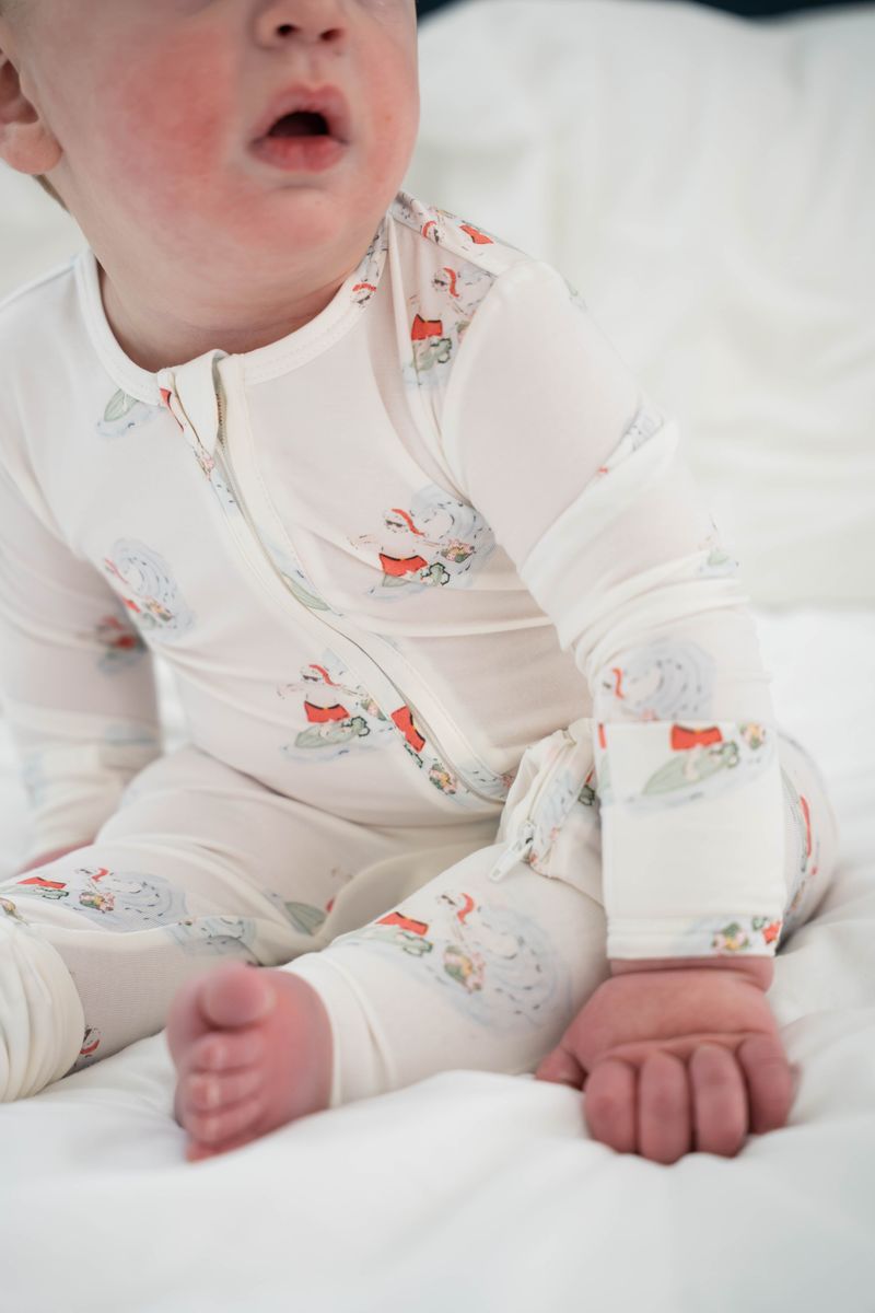 Saltwater Boys BABY ROMPER- SURFING SANTA