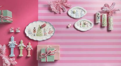 FLOCKED NUTCRACKER SITTER